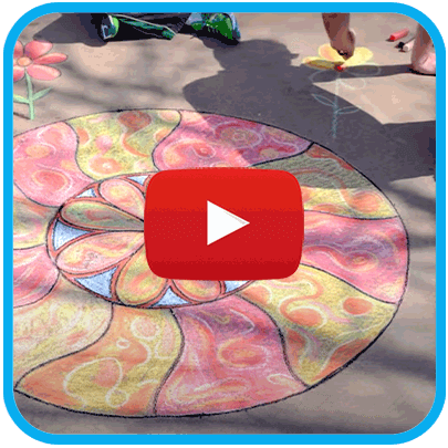 video of artist drawing a mural on sidewalk