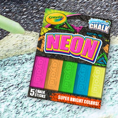 Neon chalk laying on asphalt
